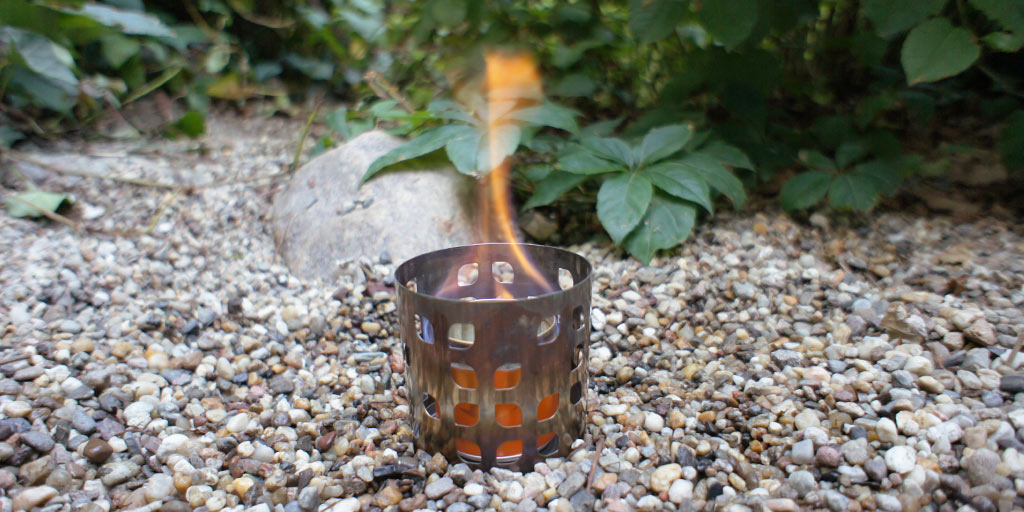 The flame of an alcohol stove is almost invisible during the day.