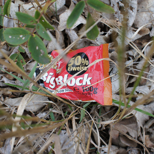 Plastic wrapper in the woods.
